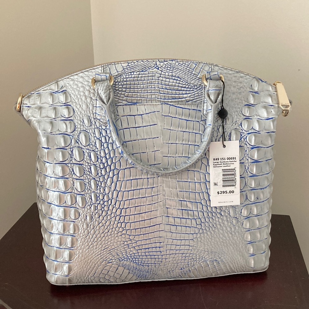 Eggshell Brahmin large sachel authentic card on zipper has Brahmin